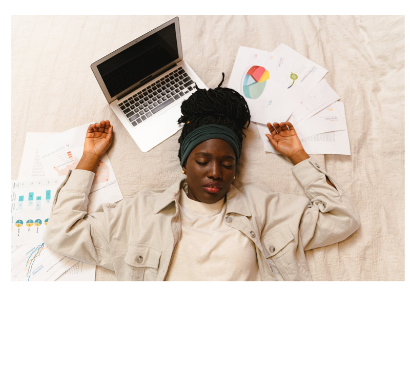 a woman burnt out and stressed from digital devices and overload struggles