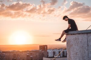 depressed man struggling with the pressure of keeping quiet contemplates life