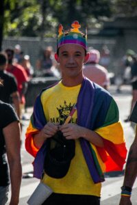 Authentic pride man member of LGBTQ community walking for wellbeing and mental health